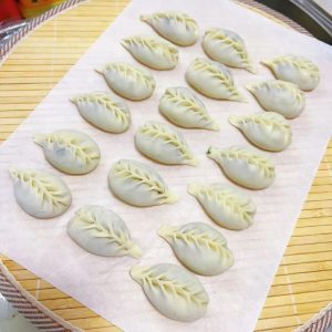 Fold willow-leaf, or wheat-ear, dumplings for steamed dumplings, potstickers, or pan-fried dumplings.