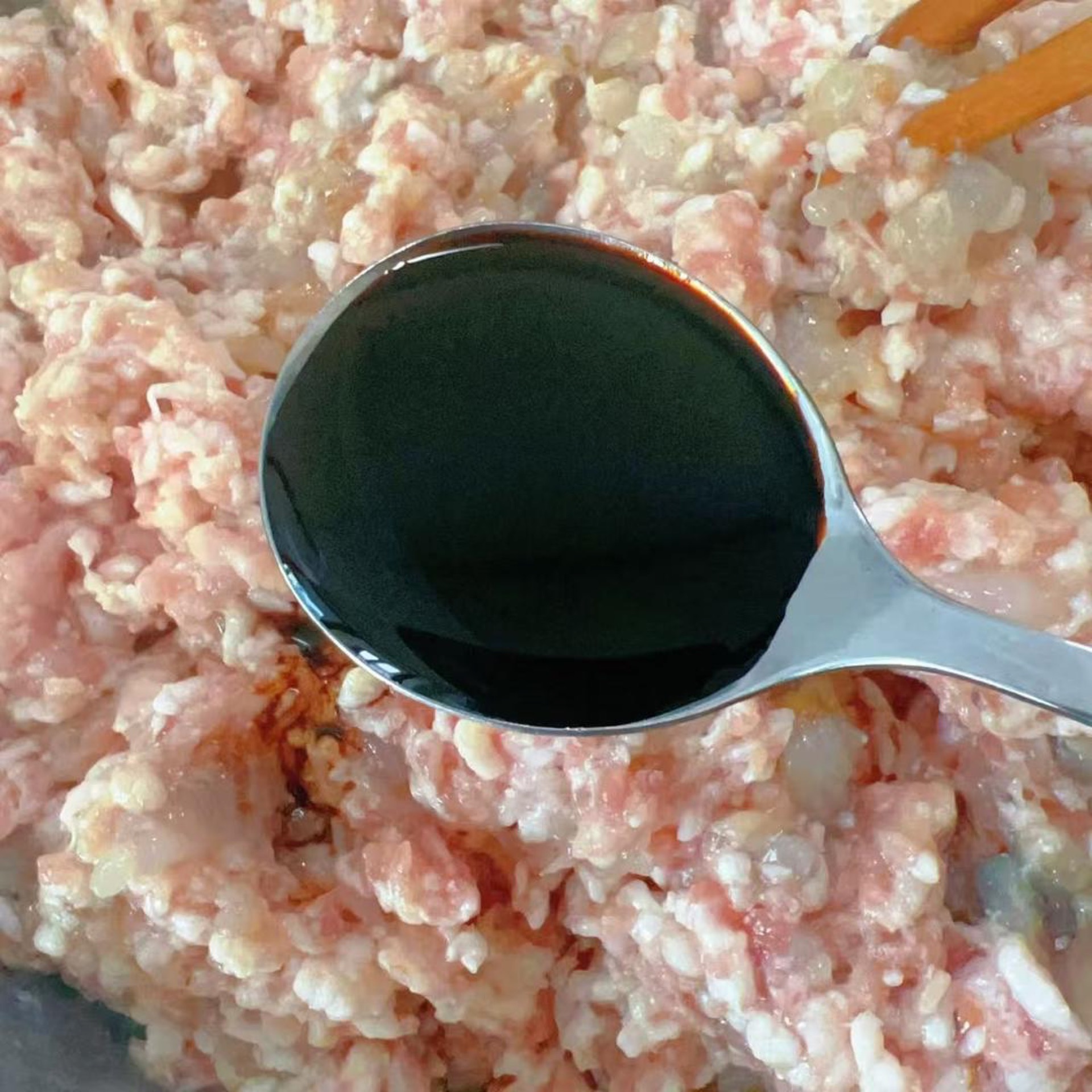 Stir in 4 tsp of light soy sauce.