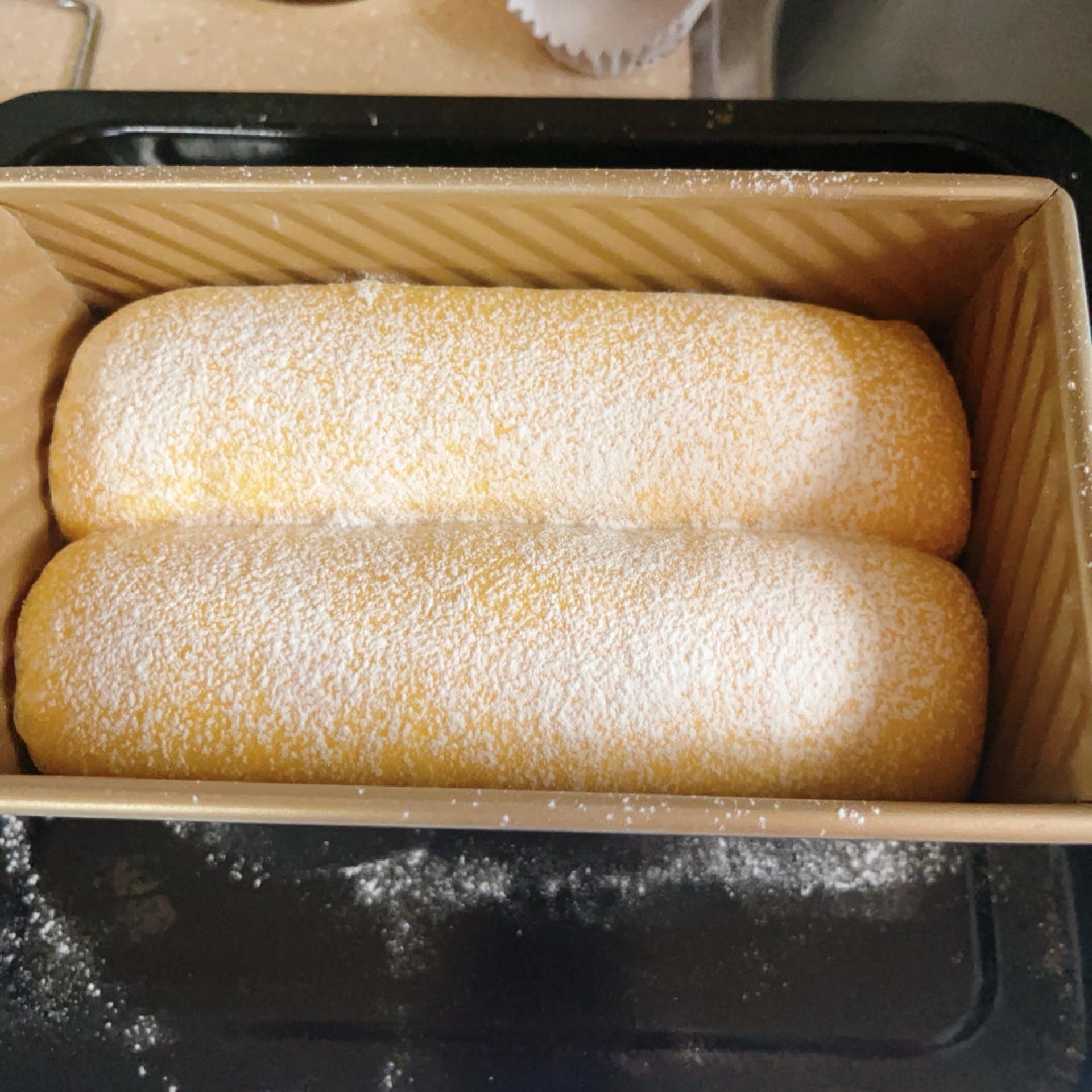 Flour dusted over the top of the proofed loaf