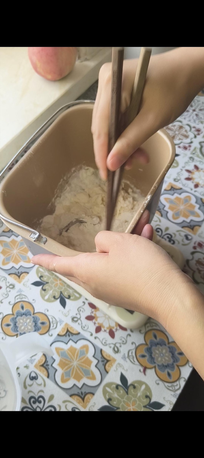 Hot and cold water being mixed into the flour separately