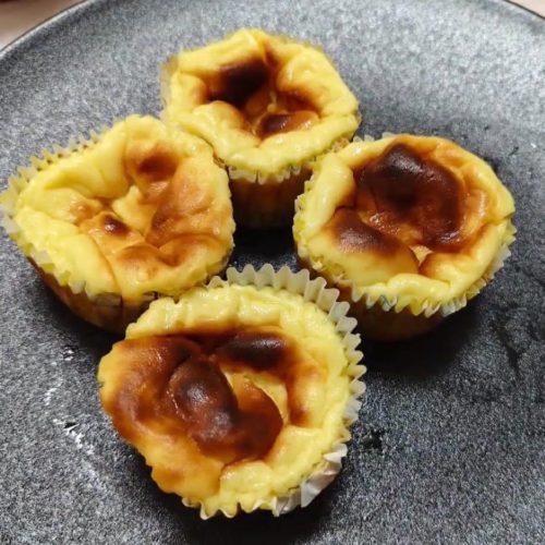 Quick cup durian Basque cheesecakes in paper cups with blistered tops
