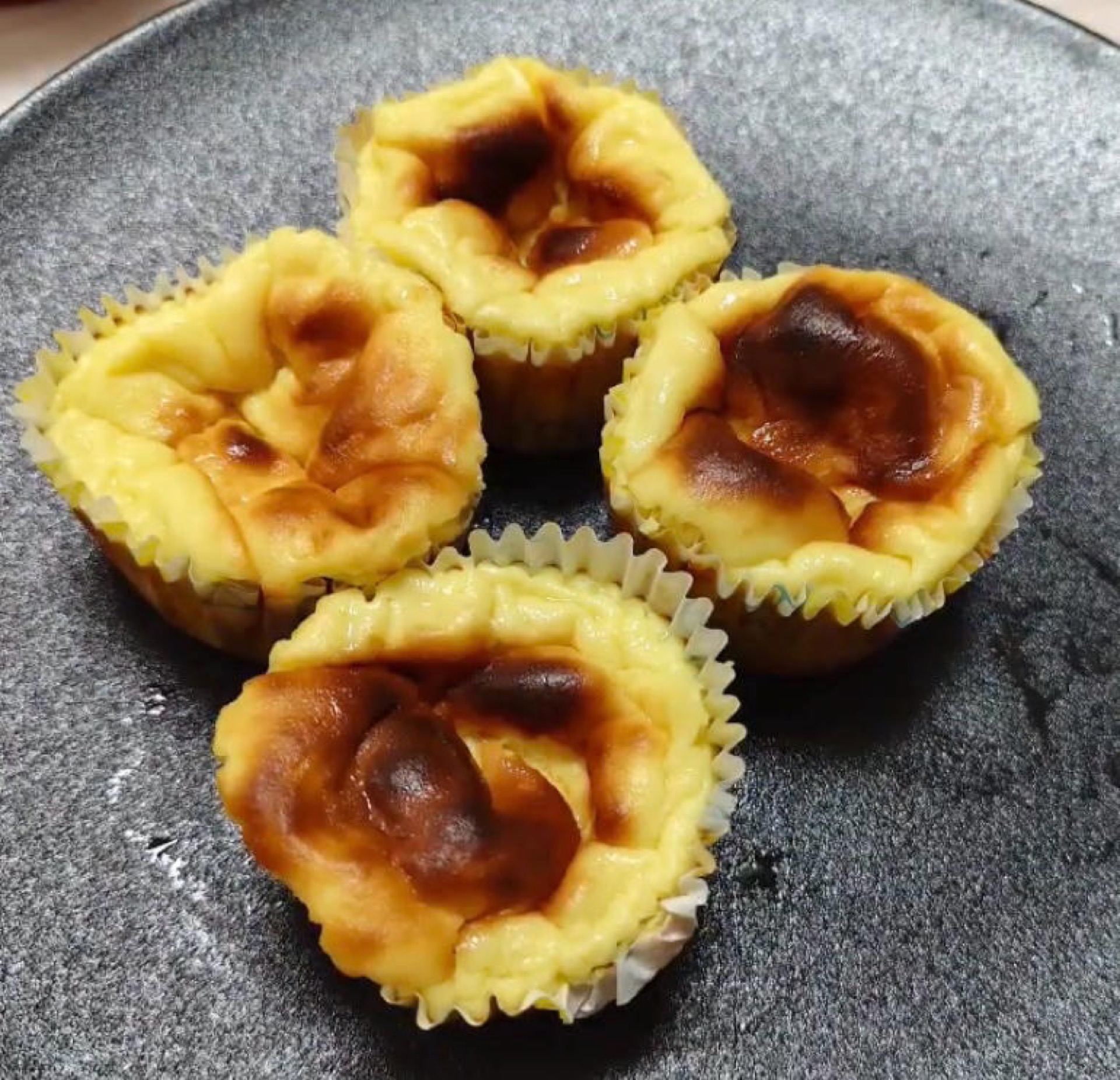 Durian Basque cheesecake cups packed for travel with an ice pack