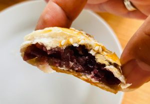 Warm golden red bean puff pastry bites on a plate