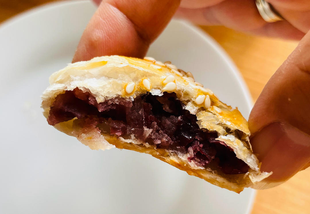Warm golden red bean puff pastry bites on a plate