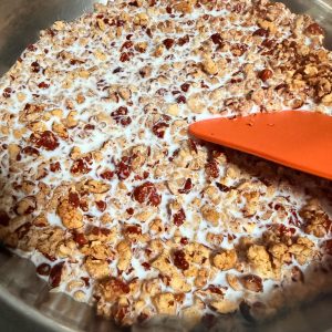 Warming red dates with milk in a saucepan