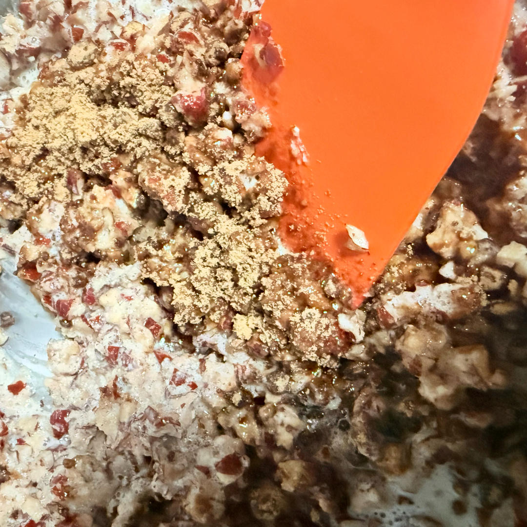 Adding brown sugar to the date and milk mixture