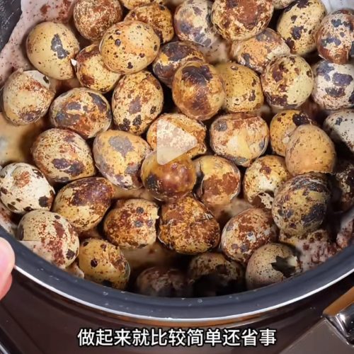 Tender salt-baked quail eggs with cracked shells on a plate