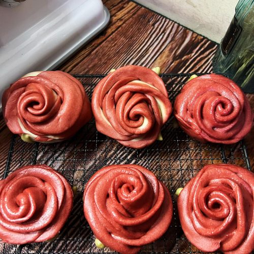 Rose-shaped steamed buns with red and green dough petals