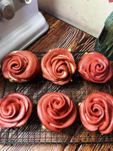 Finished rose-shaped steamed buns fresh from the steamer