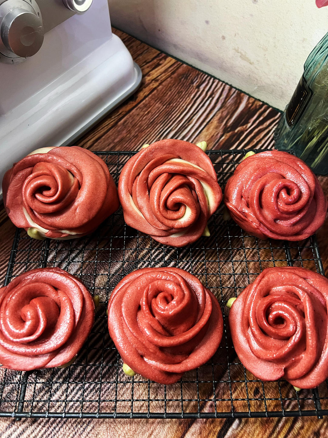 Finished rose-shaped steamed buns fresh from the steamer