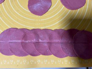 Eight overlapping dough discs with a chopstick crease
