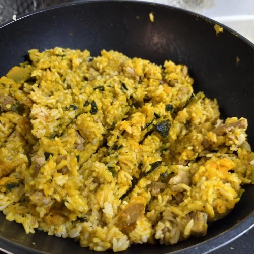 Golden savory pumpkin rice with pork and peanuts
