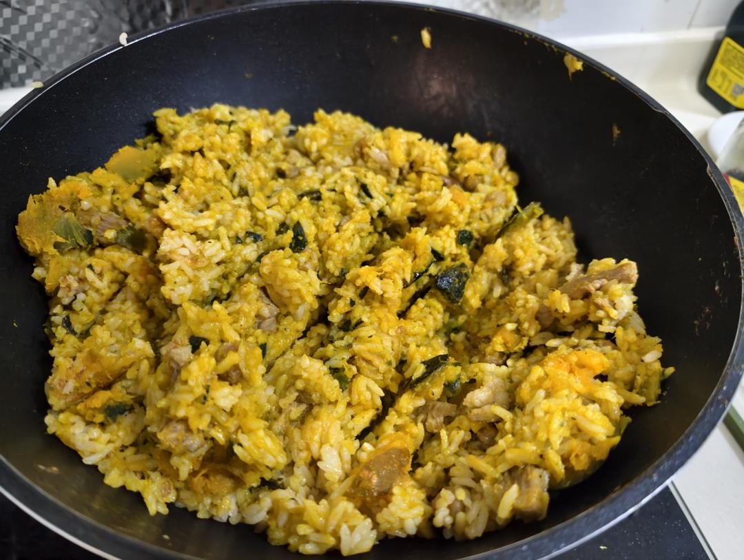 Golden savory pumpkin rice with pork and peanuts