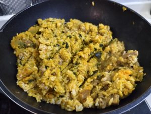 Finished pumpkin rice with the pumpkin mashed into golden grains