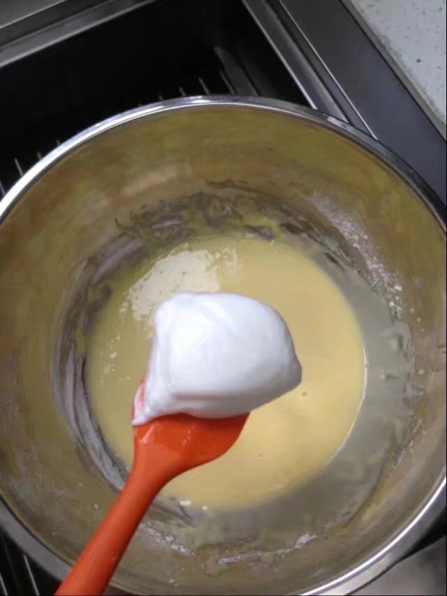Fold 1/3 of the meringue into the yolk batter