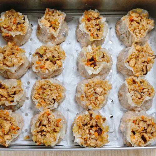 Shiitake chicken siu mai in a bamboo steamer