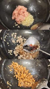 Chicken and aromatics stir-frying in a wok