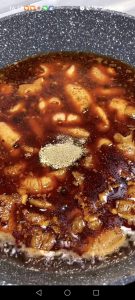 Add the water, chicken bouillon powder, and white pepper, and simmer for 2 minutes.