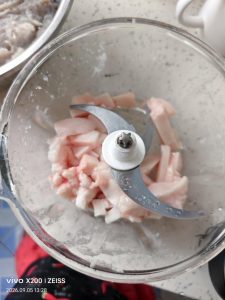 Ground pork fat ready to be added to the mackerel filling