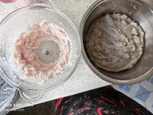 Ground pork fat being added to the mackerel paste