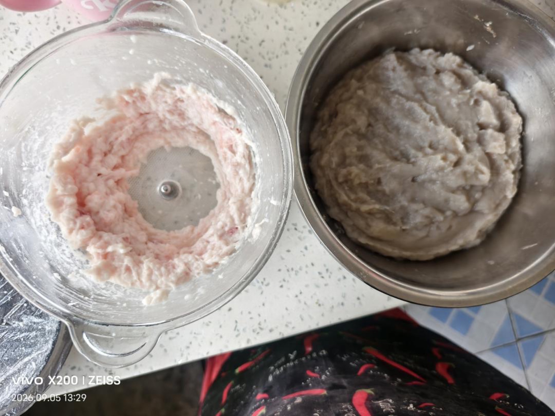 Ground pork fat being added to the mackerel paste