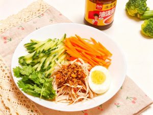 This spicy cold shredded chicken is a light, appetite-whetting summer plate — the oil-poached chili crisp can be poured, tossed, or dipped, making it a fast and easy cold side for