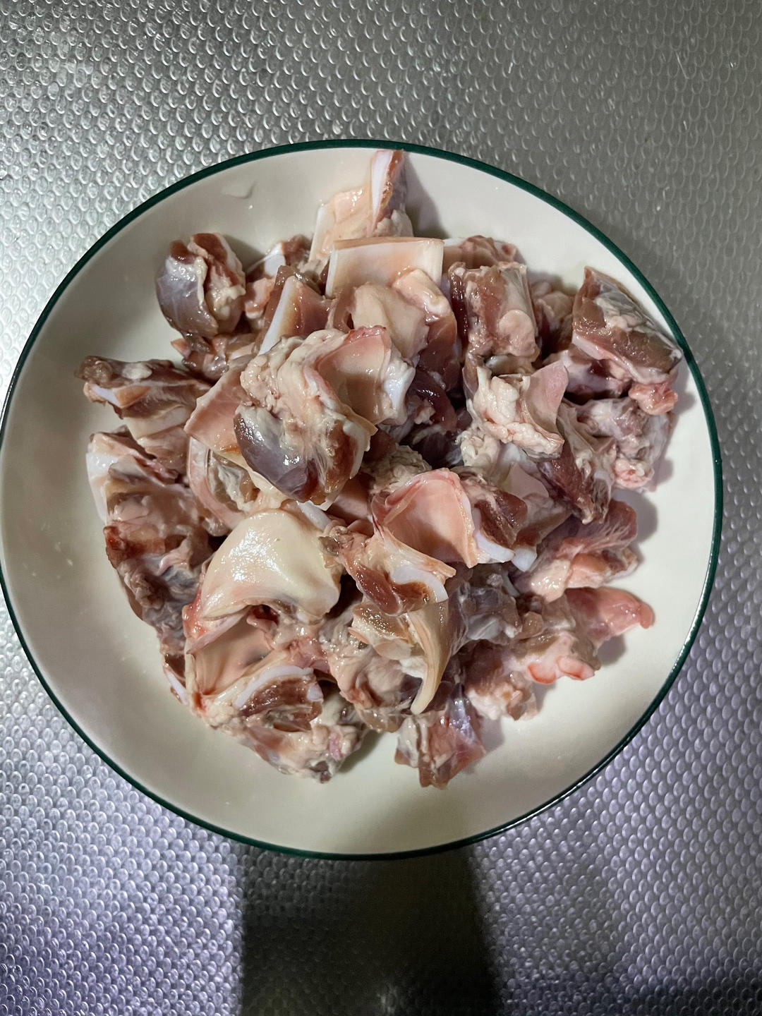 Soak the pork cartilage in cold water then rinse and cut into bite size pieces