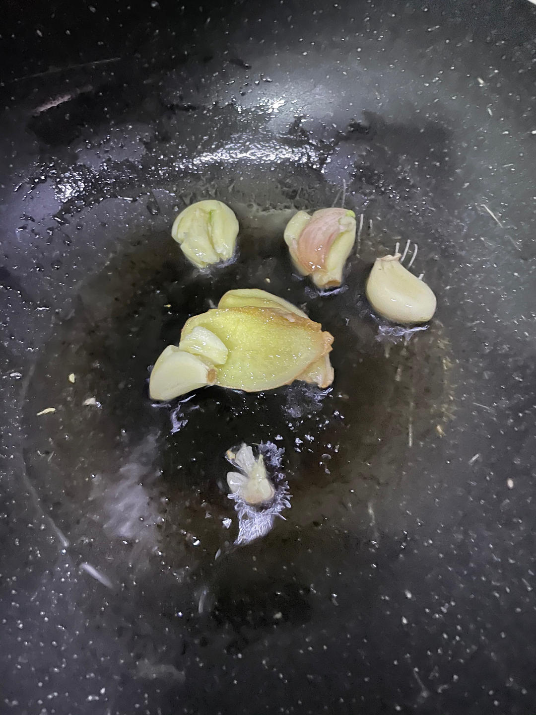 Fry ginger garlic Sichuan peppercorns and star anise then add the pork cartilage