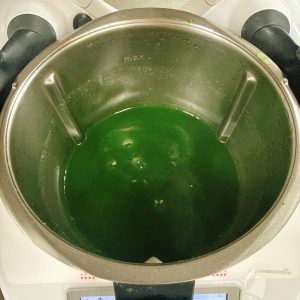 Cook the mixture for 15 minutes at 100°C (212°F), stirring constantly at a steady speed, until it thickens into a glossy paste.