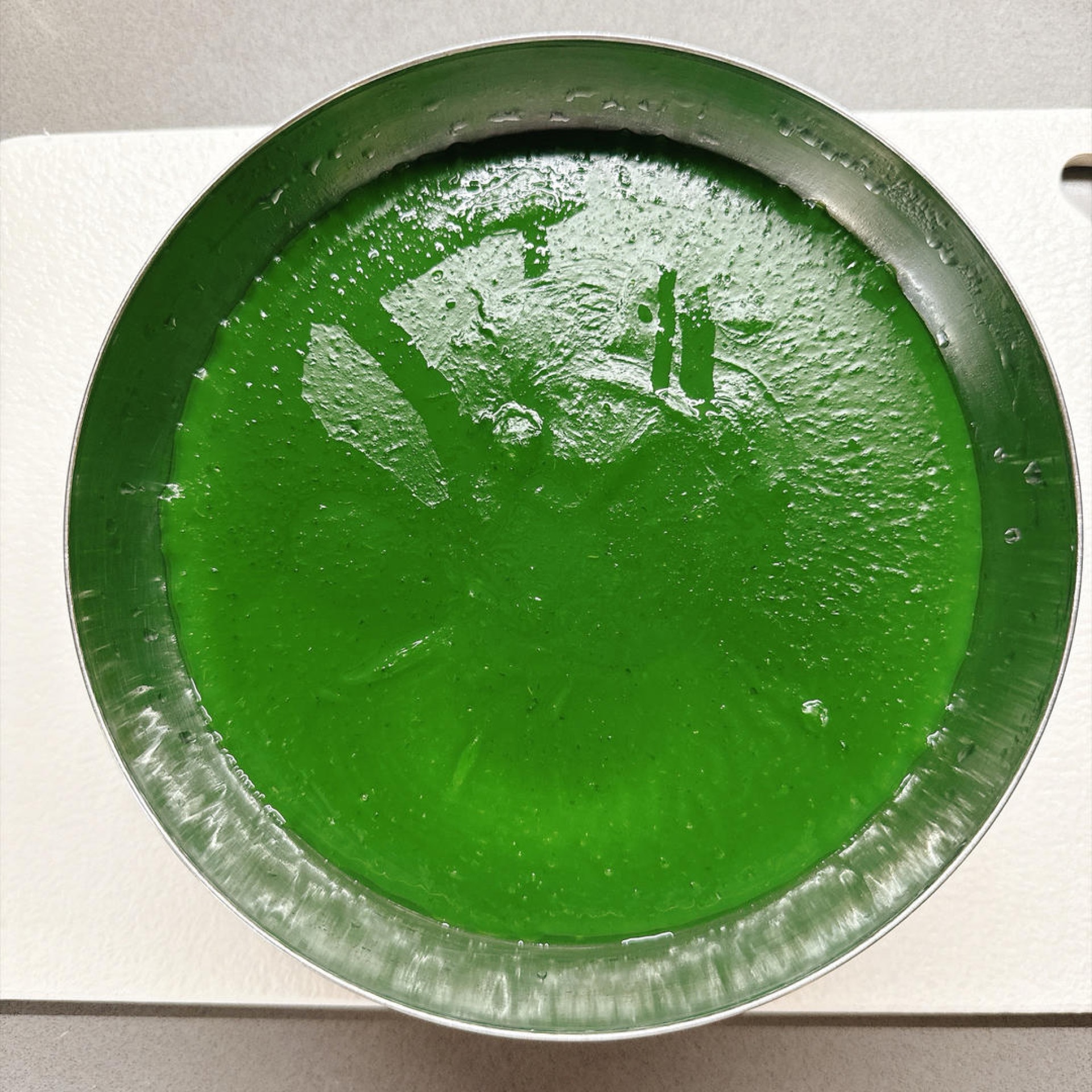 After 4 hours the jelly is a deep jade green, like polished stone.