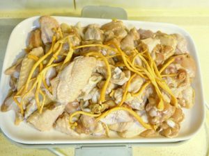 Transfer the chicken to a steaming plate, scatter the rinsed cordyceps flowers over the top, and steam at high heat for 25 minutes — for an older bird use the gentle setting for 45