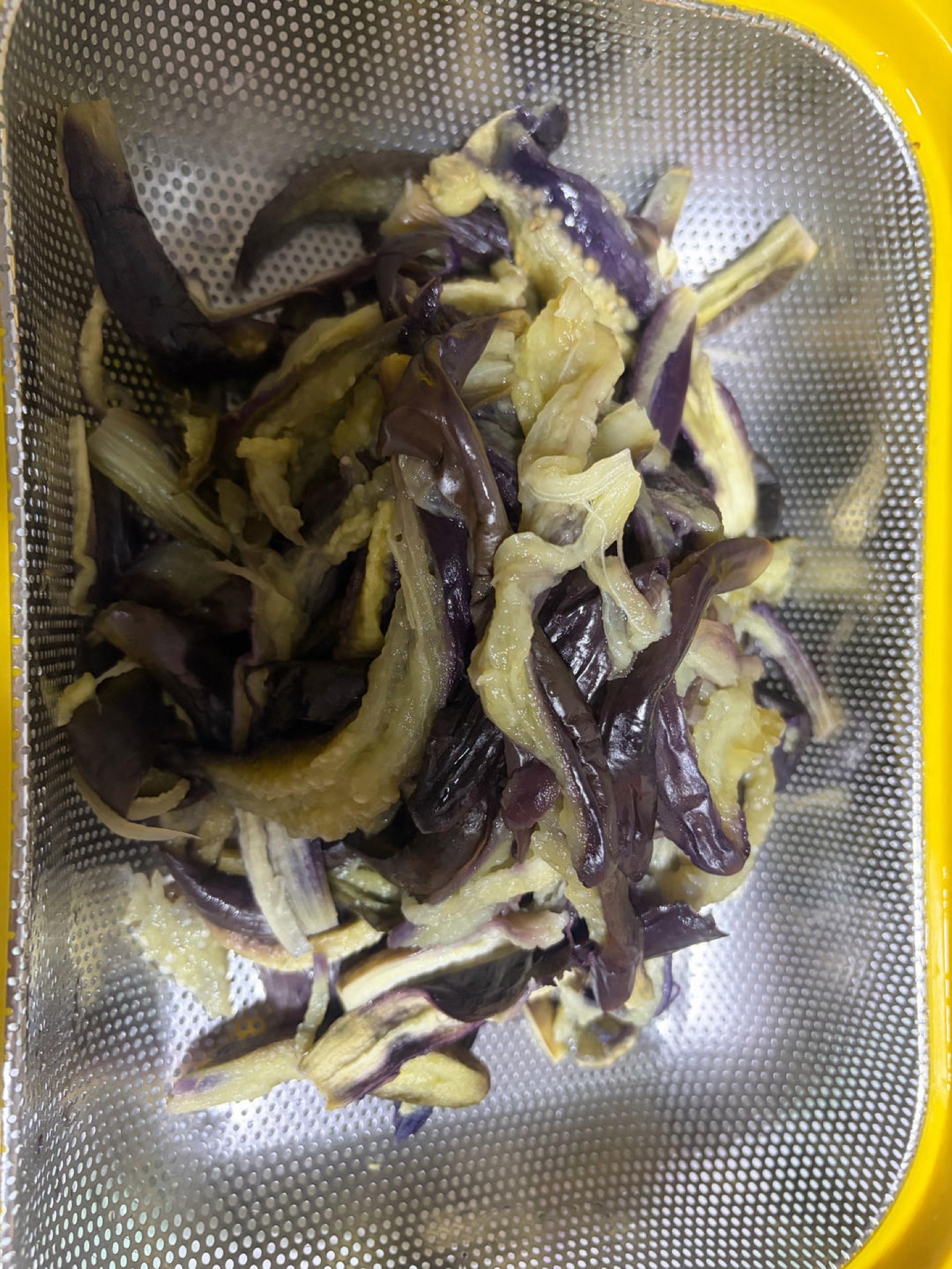 Let the eggplant cool, then tear it into strips with your hands and set aside (you can leave the eggplant out entirely if you do not care for it).