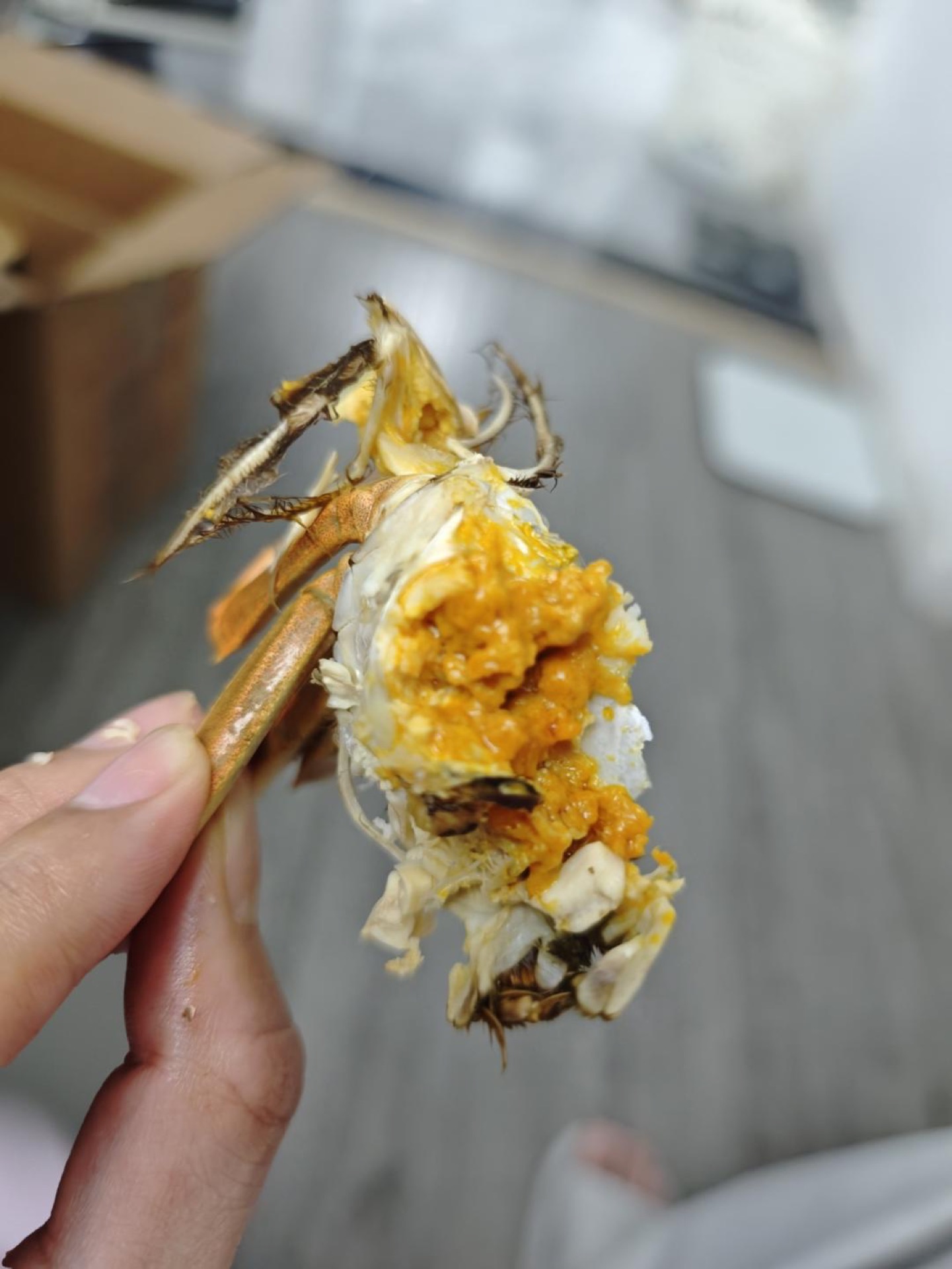 Steamed hairy crab with ginger and scallion on a plate