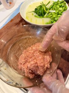 Keep stirring and slapping the mixture against the bowl until it looks cohesive like this and no longer falls apart.