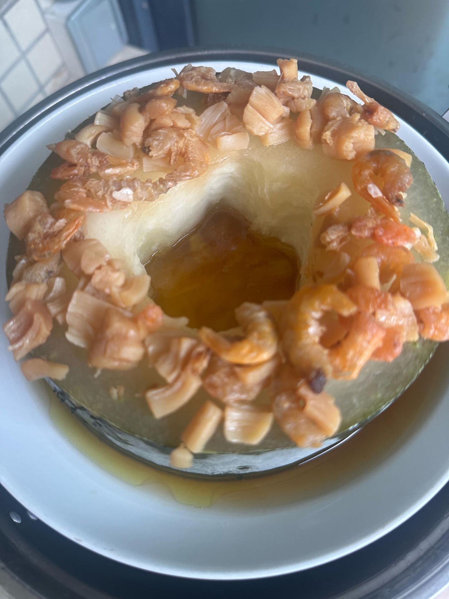 When the melon is nearly cooked through, it should look soft and slightly translucent around the edges, like this.
