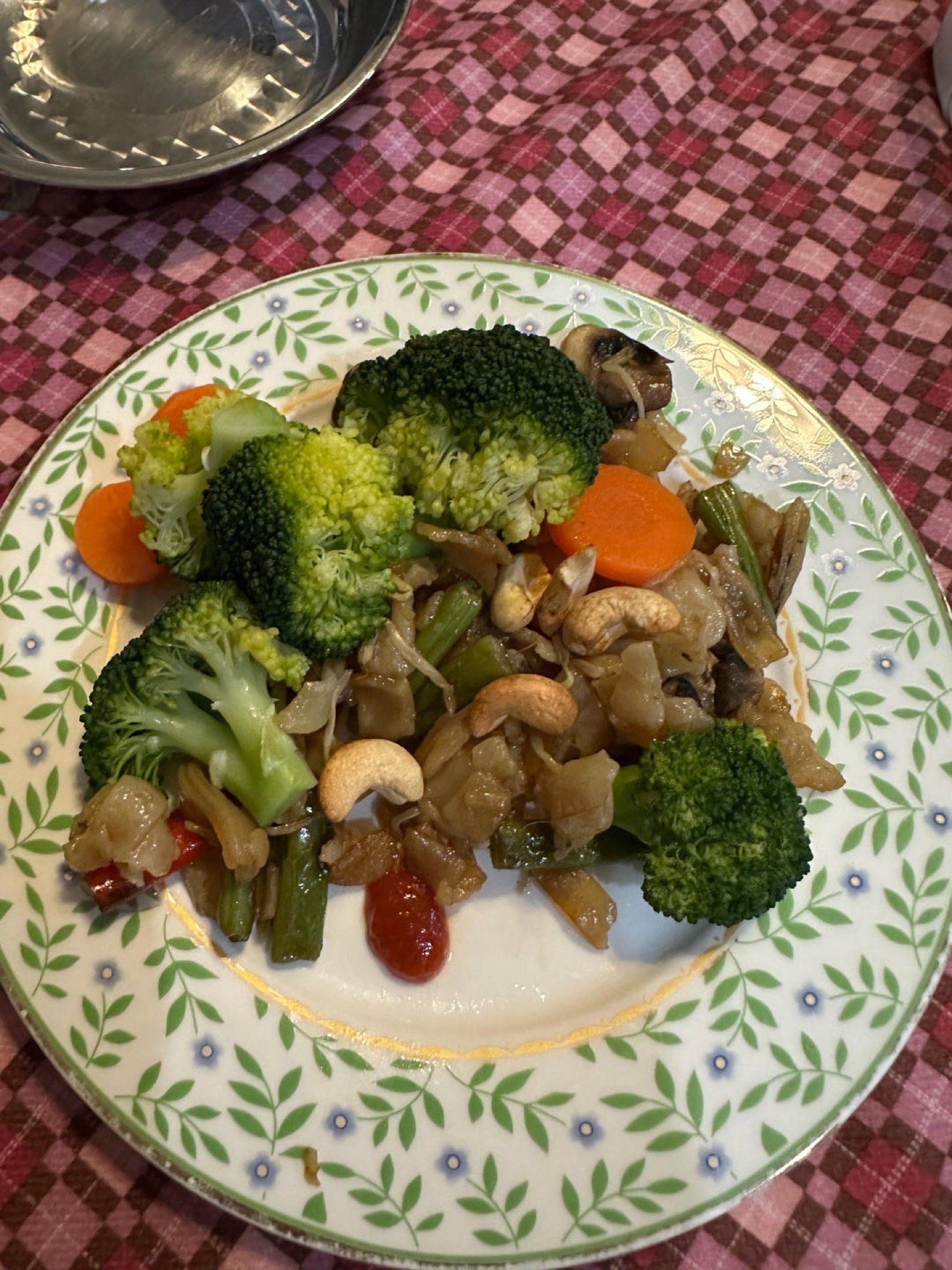 For dinner, continue with the leftovers, adding roasted cashews, extra vegetables, and chili sauce.