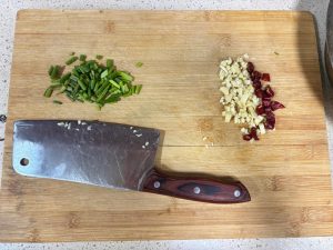 Preparing garlic chilies and scallion