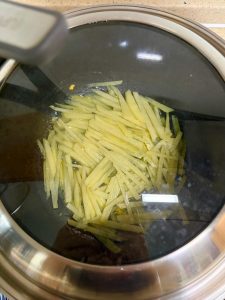Add an appropriate amount of hot water and simmer for 3-5 minutes until the potato is soft and cooked through.