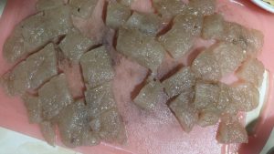 Cut the fried starch cake into bite-sized blocks.