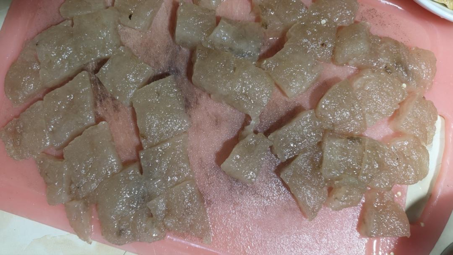 Cut the fried starch cake into bite-sized blocks.