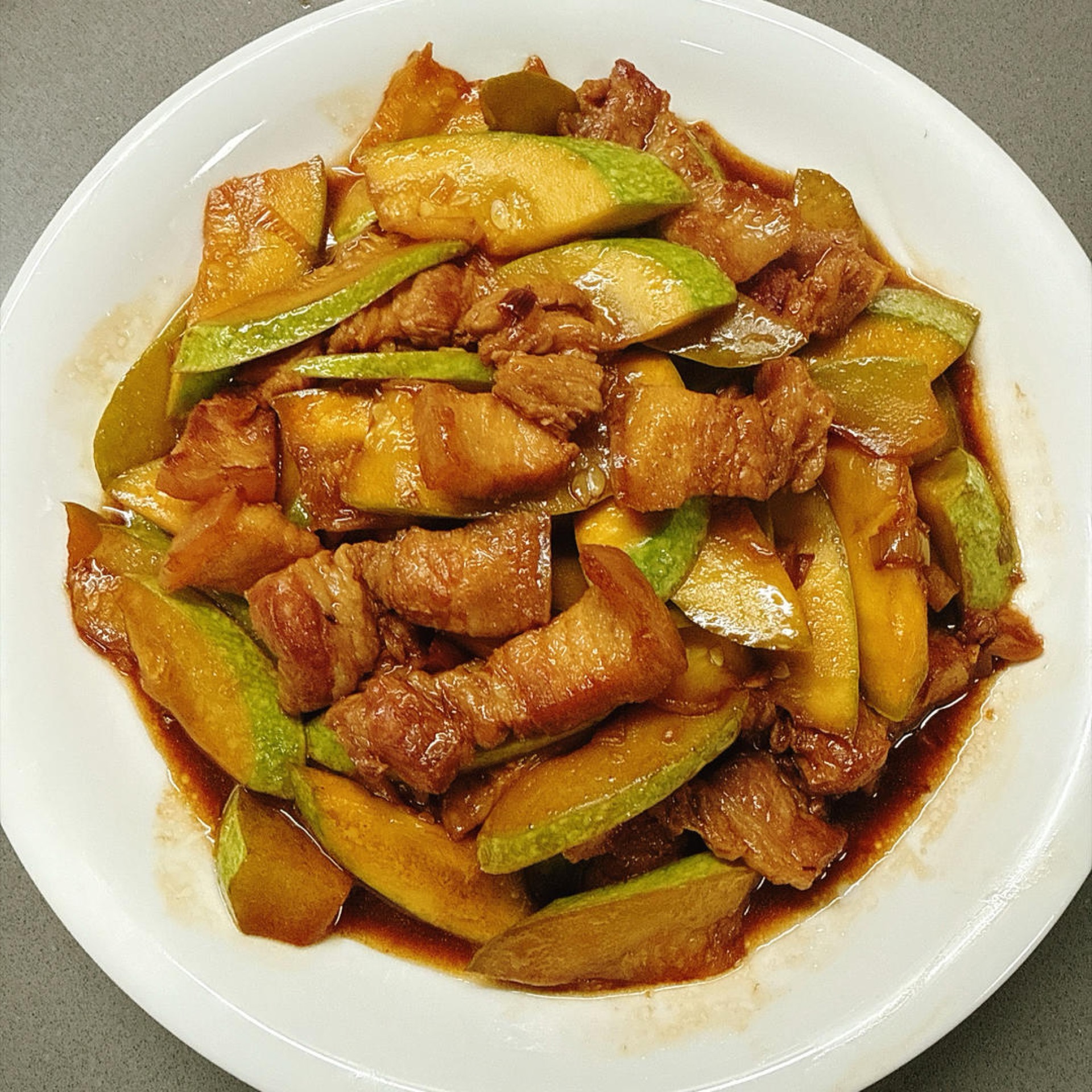 The natural sweetness of the zucchini cuts right through the richness of the pork. That collision of fresh and savory is one bite of home.