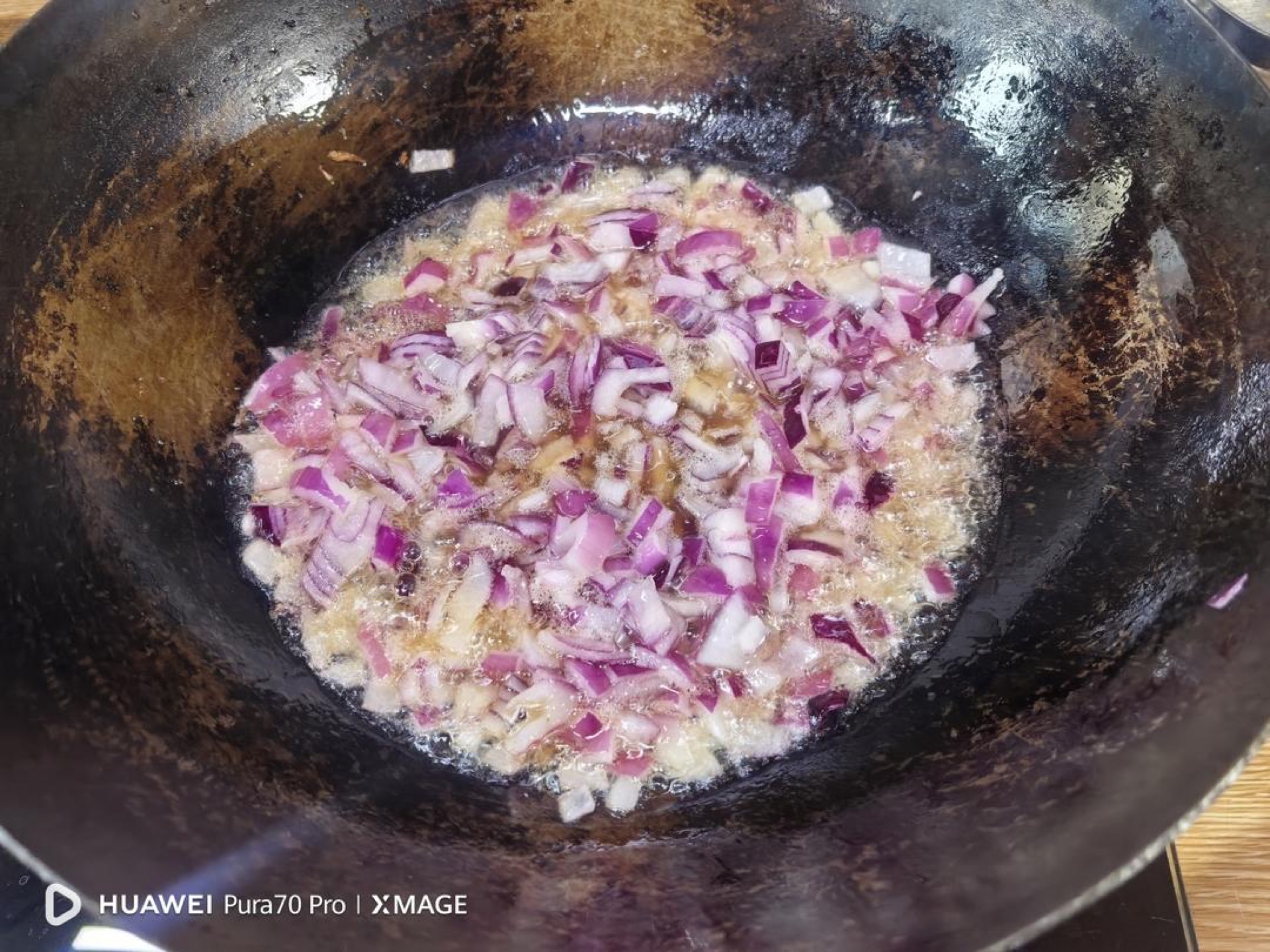 Diced onion frying to golden brown shallots