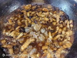 Soy sauces vinegar and rock sugar added to the braise