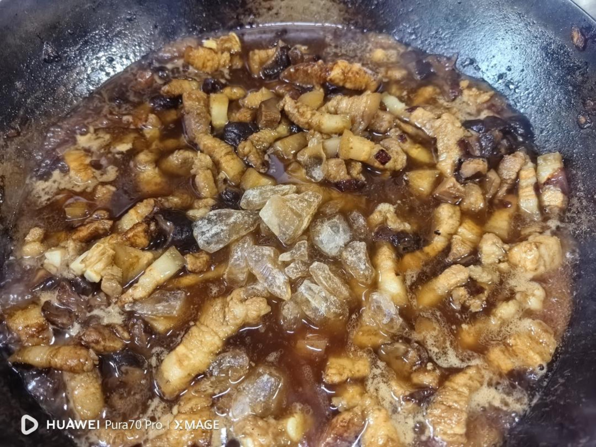 Soy sauces vinegar and rock sugar added to the braise