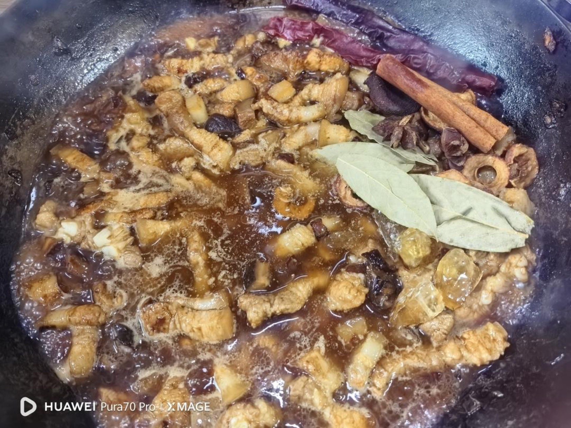 Whole braising spices added to the pot