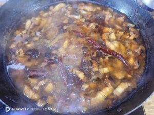 Beer poured over the braise before a long simmer