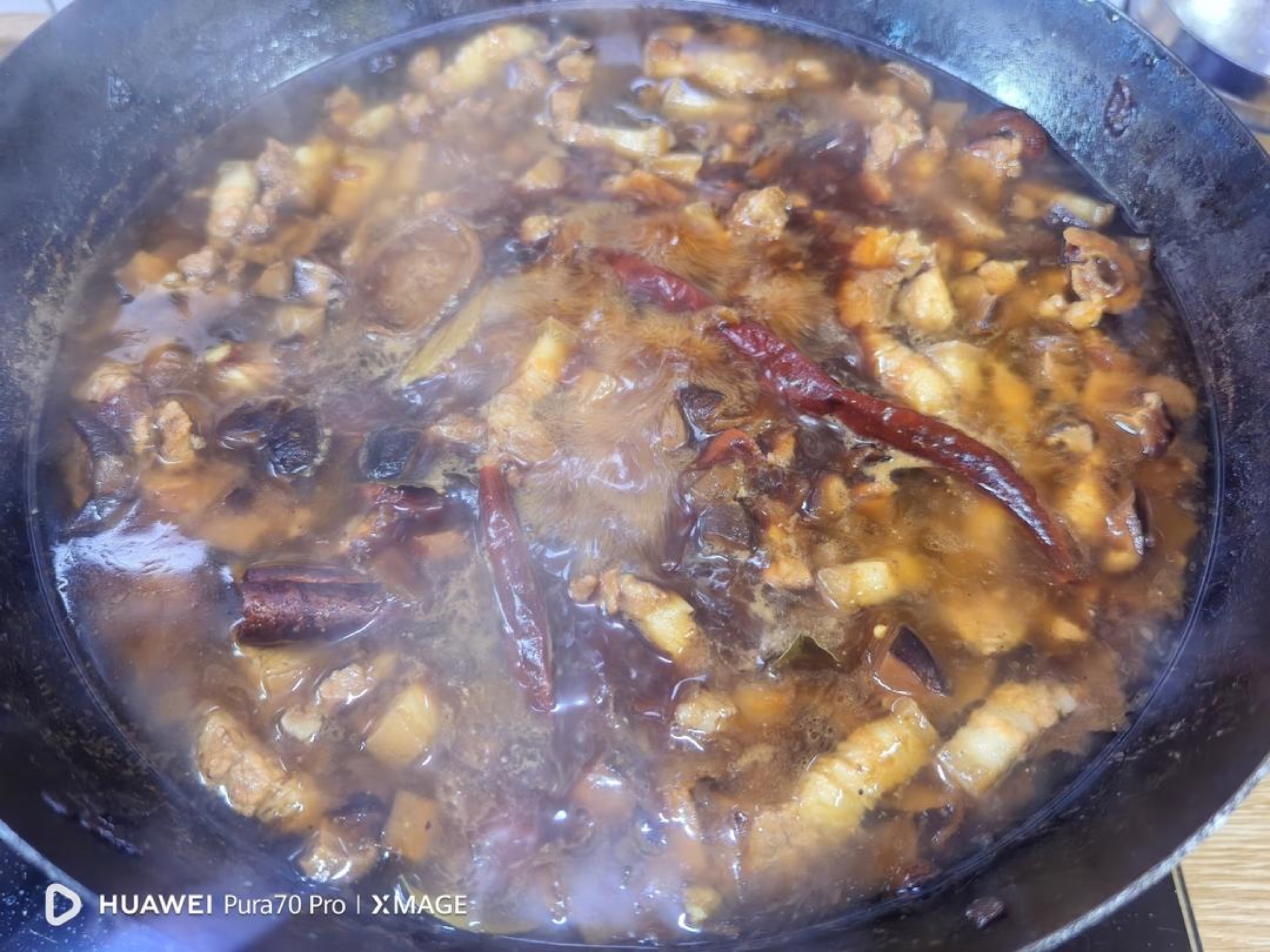 Beer poured over the braise before a long simmer