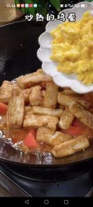 Add the pan-fried tofu back into the pan.