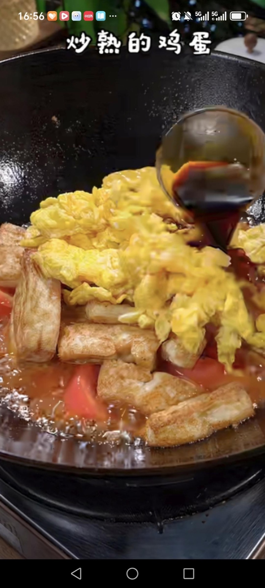 Add the fried eggs into the pan.