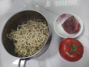 You can peel the tomato if you like, but leaving the skin on is perfectly fine too.
